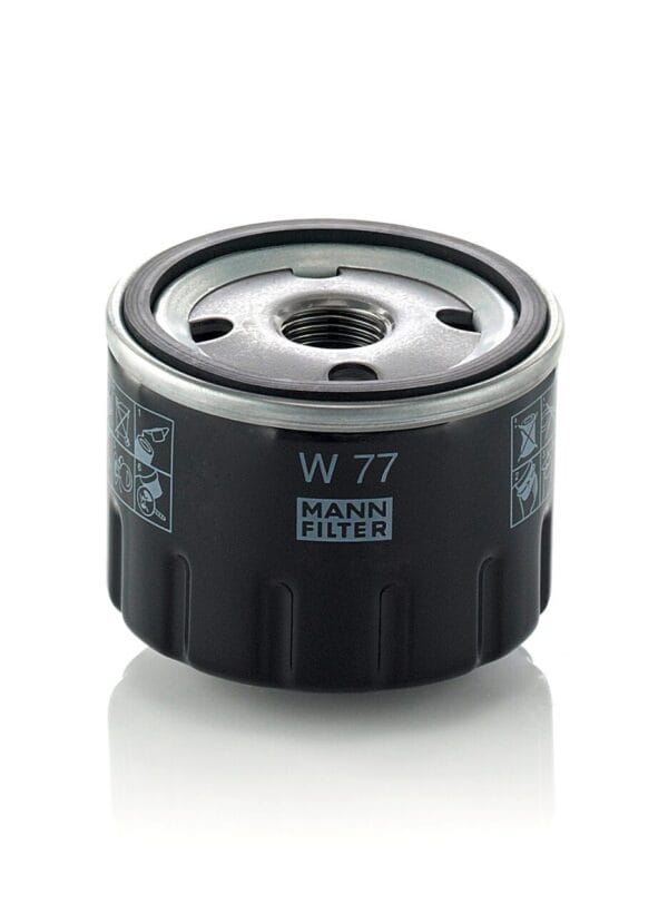A black Mann oil filter, model W 77, is displayed against a white background, emphasizing its circular design and fittings inspired by the precision engineering seen in the B7165, P502024, 57035 Donaldson oil filter 492932.