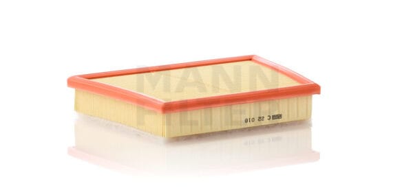 Rectangular air filter with an orange rim resting on a reflective surface.