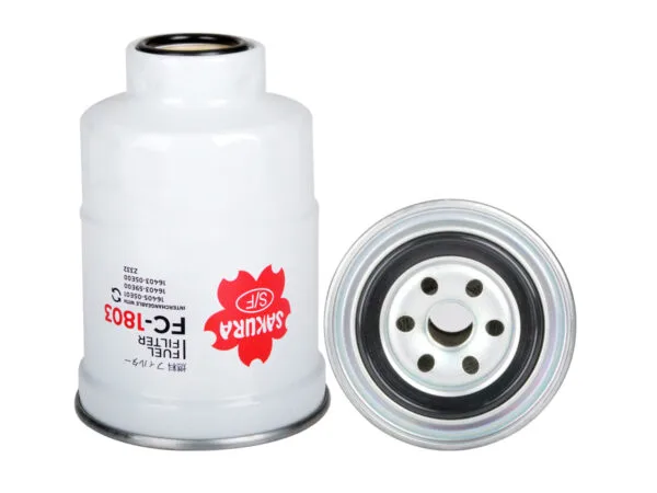 Two white cylindrical oil filters; one upright with red and black text, the other on its side showing the metal fitting end.