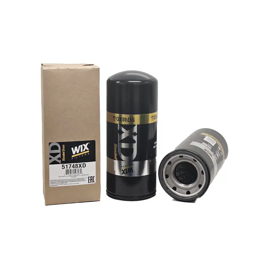Two black WIX OIL FILTER 51748XD units, one upright and one on its side, rest next to a labeled brown cardboard box.